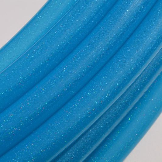 Close-up of The Spinsterz blue glitter polypro tubing on a white background.