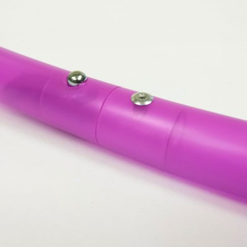 Close up of The Spinsterz Furious Fuchsia polypro hula hoop. Snap button and rivet connection.