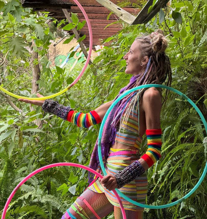 The Spinsterz hoop artist performing on the beach