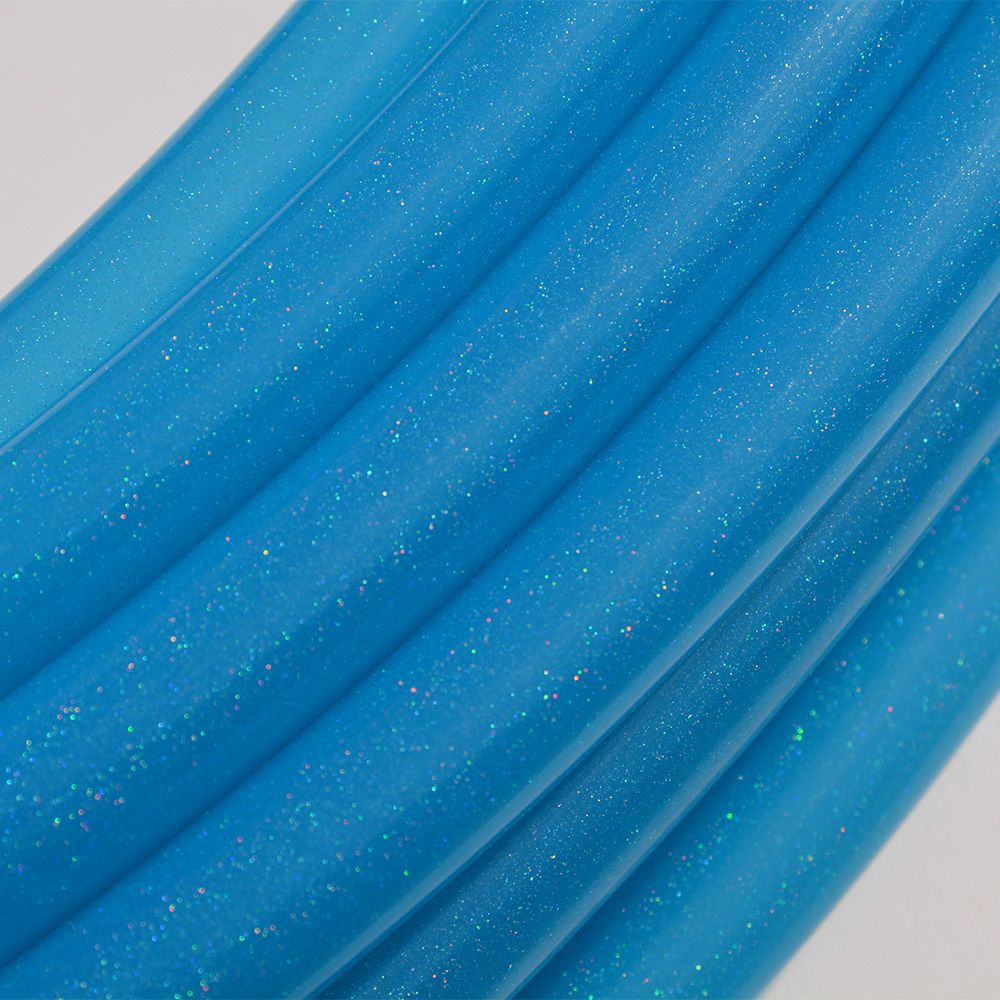 Close-up of The Spinsterz blue glitter polypro tubing on a white background. 